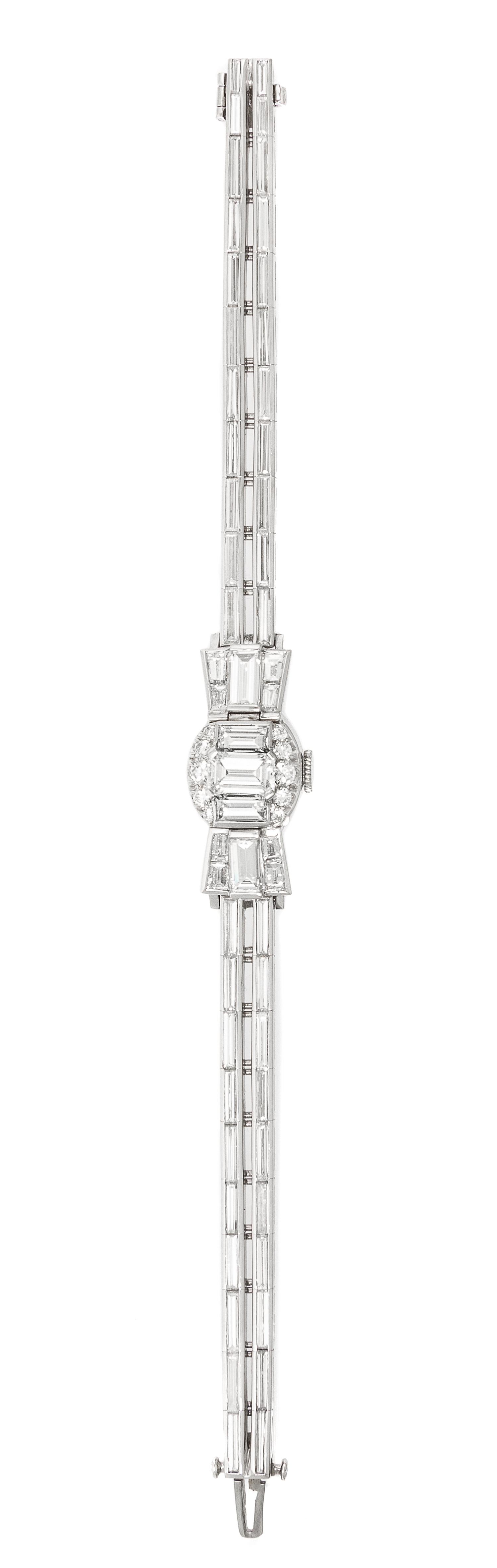 A Platinum and Diamond Surprise Watch, Lucien Piccard, 26.20 dwts.