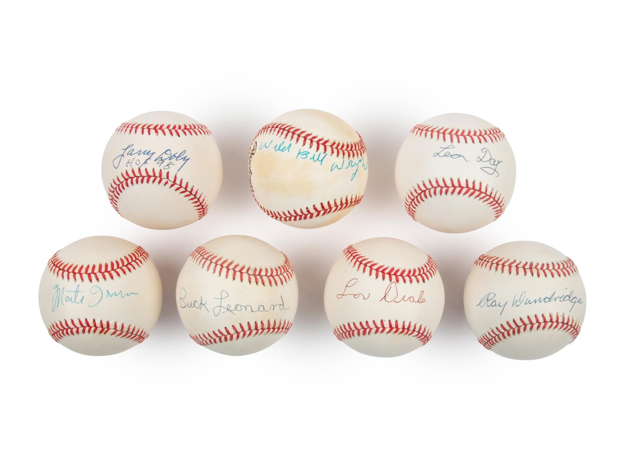 A Collection of Seven Negro League Greats Signed Autograph Baseballs (JSA)
