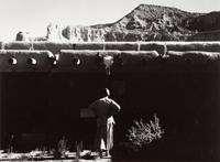 A group of four photographs ( O'Keeffe, Glen Canyon , 1961 (printed 1984); Georgia O'Keeffe Photographing the Chama River , 1961 (printed 1984); Untitled (O'Keeffe walking towards building) , 1960s; Untitled (O'Keeffe walking from building ), 1959 (printed 1984))