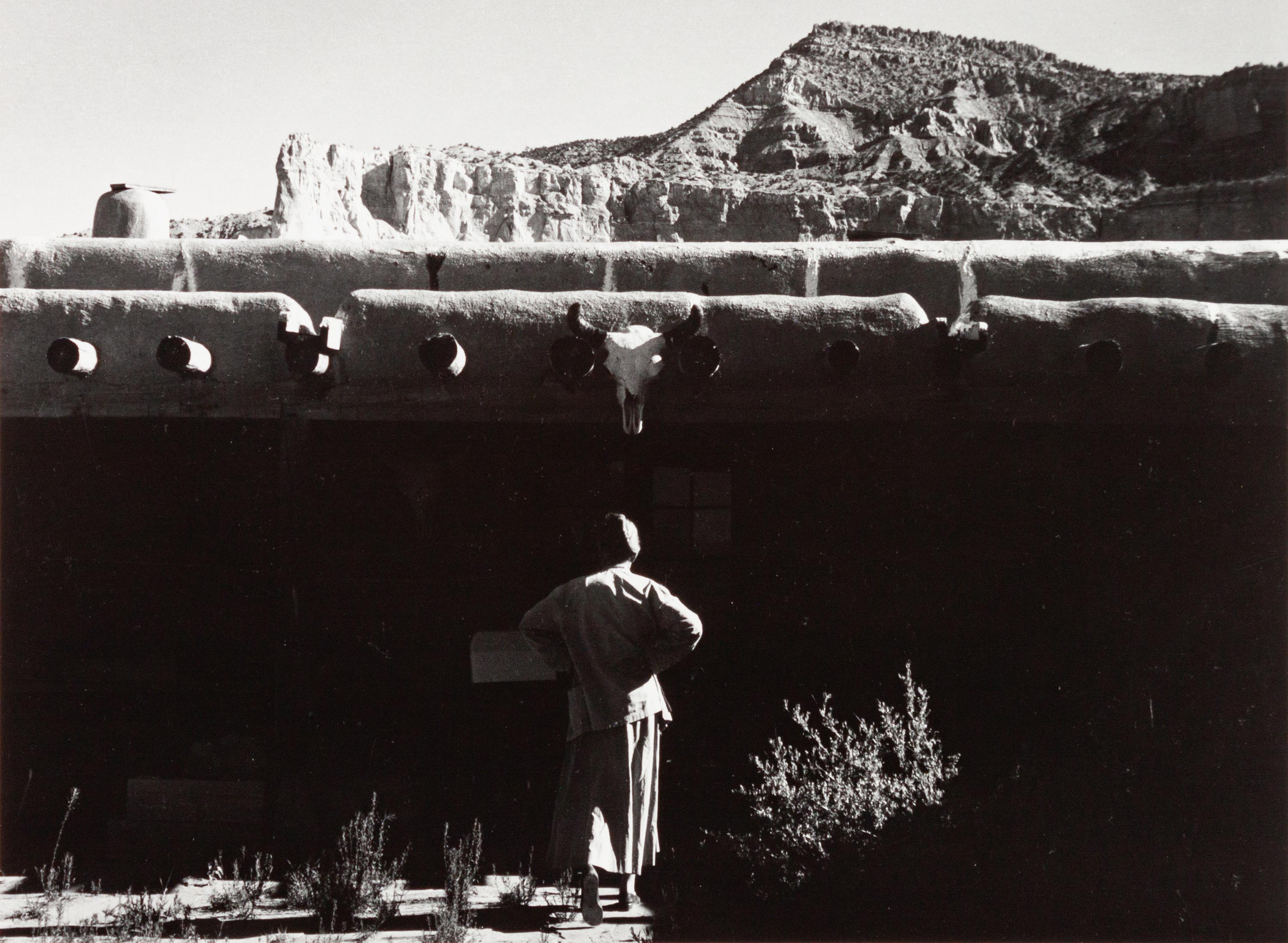 A group of four photographs ( O'Keeffe, Glen Canyon , 1961 (printed 1984); Georgia O'Keeffe Photographing the Chama River , 1961 (printed 1984); Untitled (O'Keeffe walking towards building) , 1960s; Untitled (O'Keeffe walking from building ), 1959 (printed 1984))