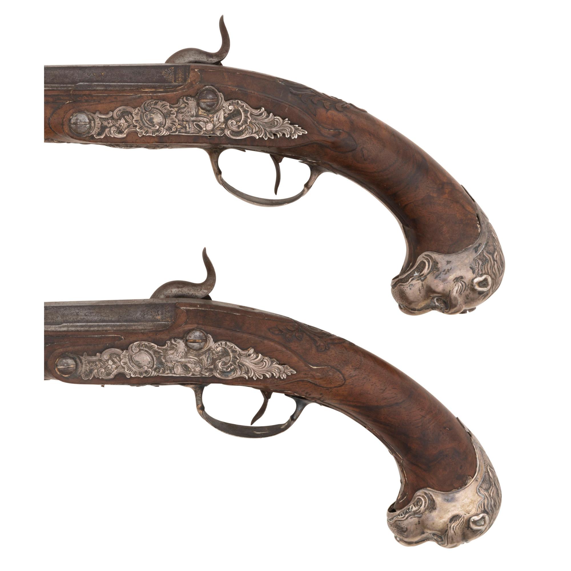A Pair of Silver Mounted French Percussion Pistols