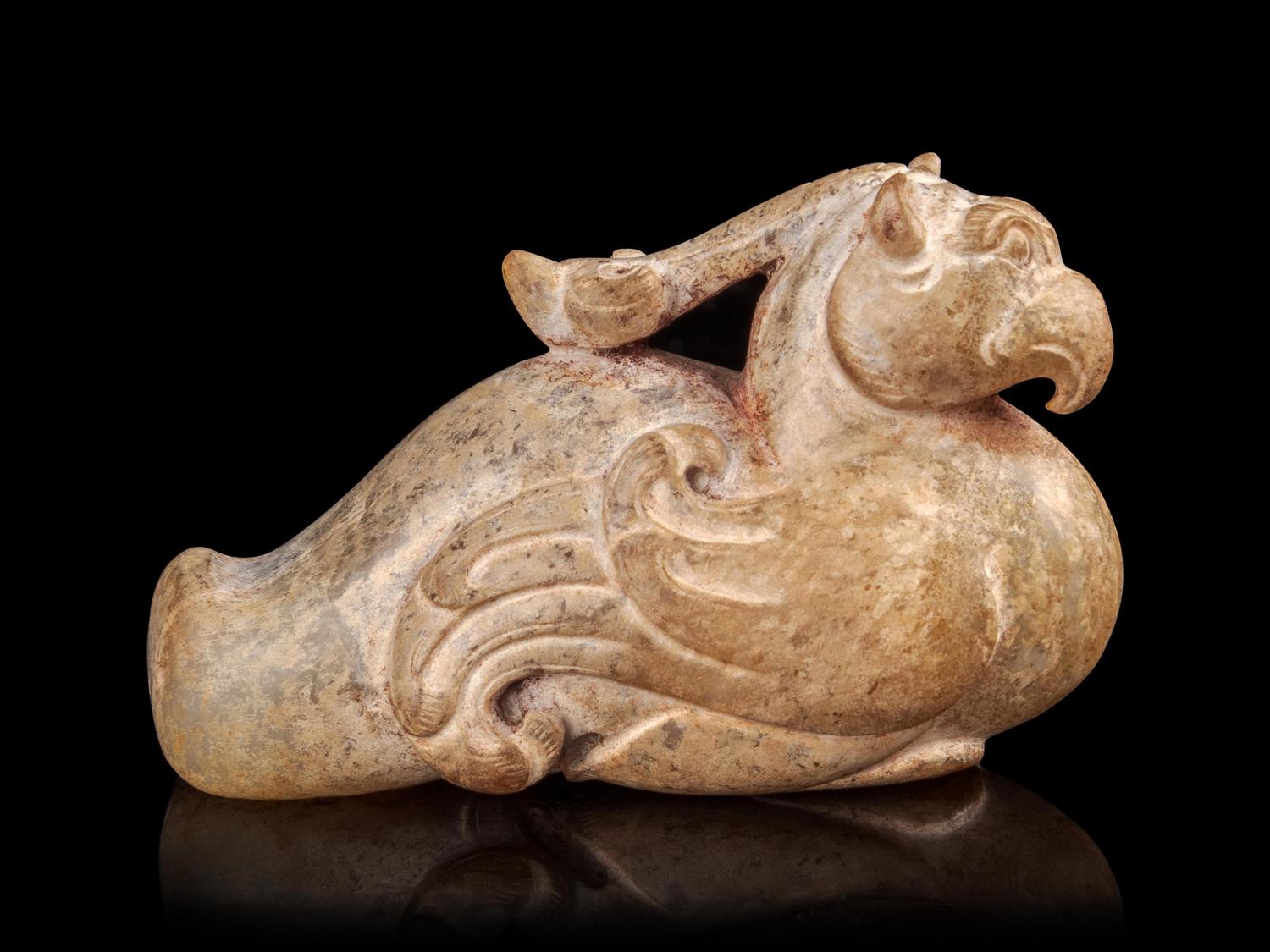 A Calcified Jade Figure of a Phoenix