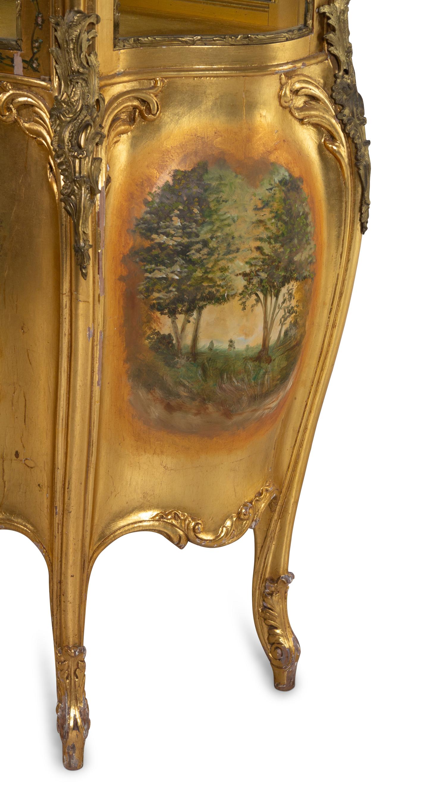 A Louis XV Style Gilt Bronze Mounted Giltwood Vitrine Cabinet
