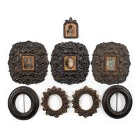 [EARLY PHOTOGRAPHY - CASES AND FRAMES]. A group of 8 cast iron wall frames, including: