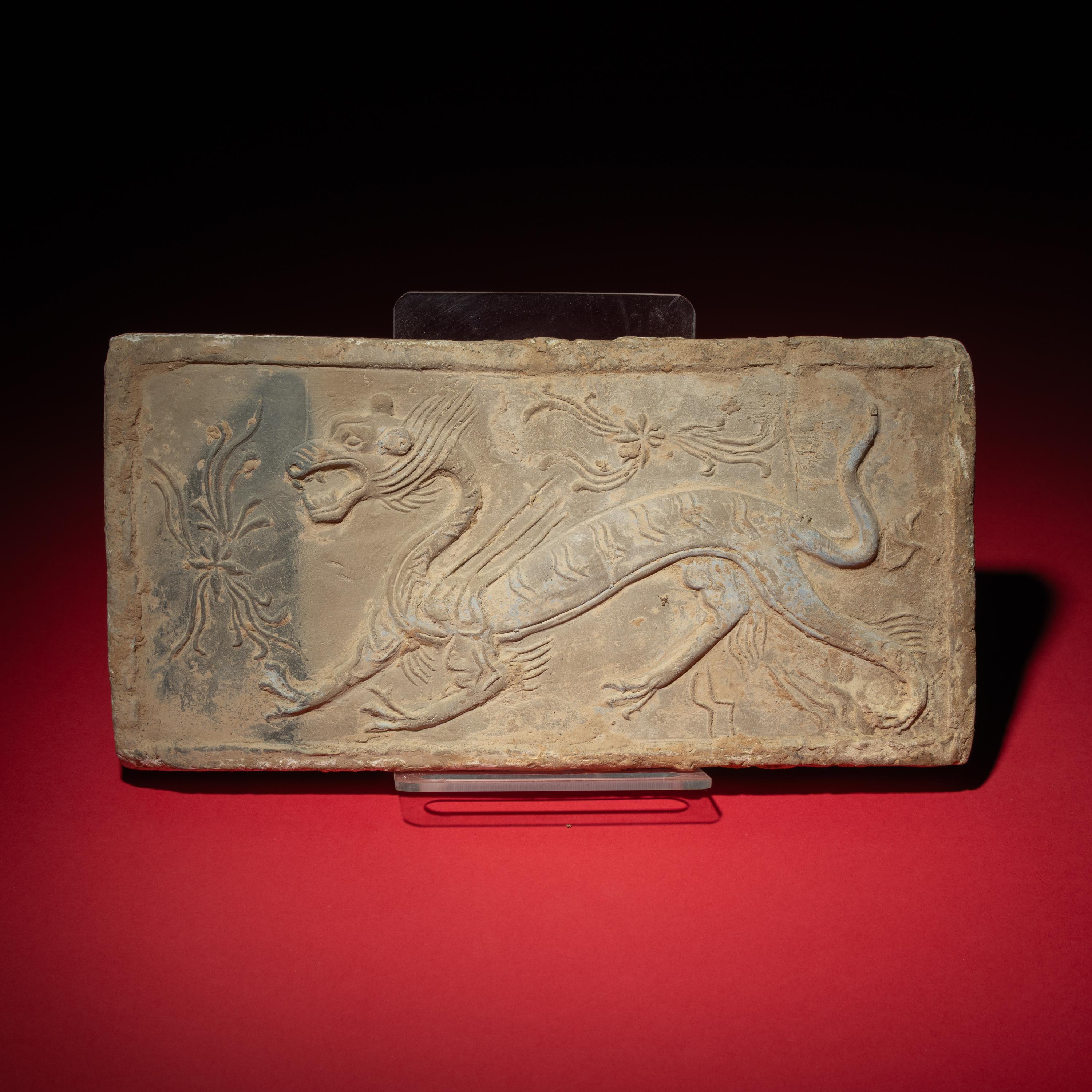 A Chinese Grey Pottery 'White Tiger' Relief Tomb Brick, Southern Dynasties — 南朝 灰陶四神白虎畫像磚