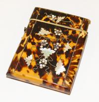 A Victorian Tortoise Shell and Mother-of-Pearl Card Case Width 4 inches.