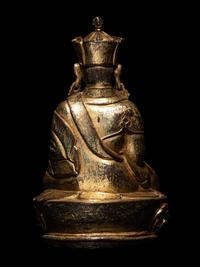 A Tibetan Gilt Bronze Figure of a Seated Karmapa
