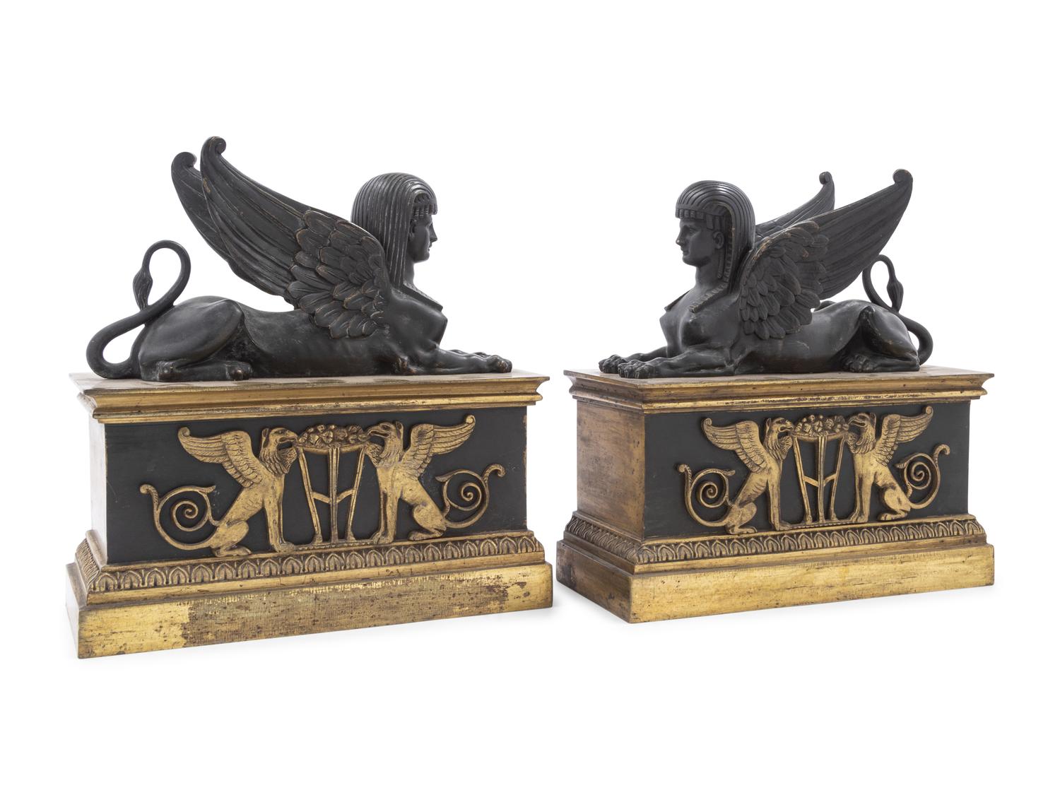 A Pair of Empire Gilt and Patinated Bronze Sphinx Ornaments