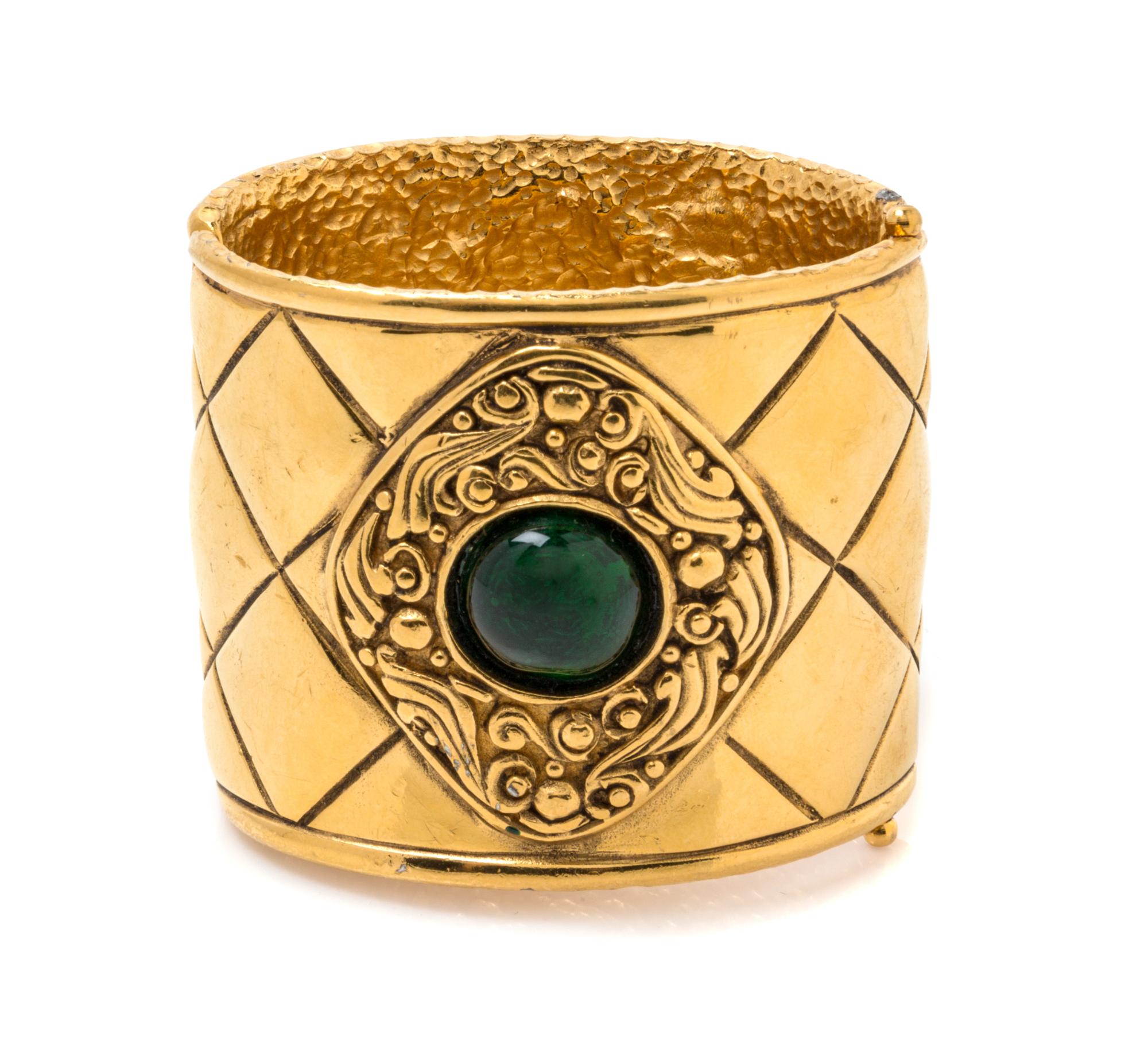 A Chanel Goldtone Cuff Bracelet, 2.25" width.