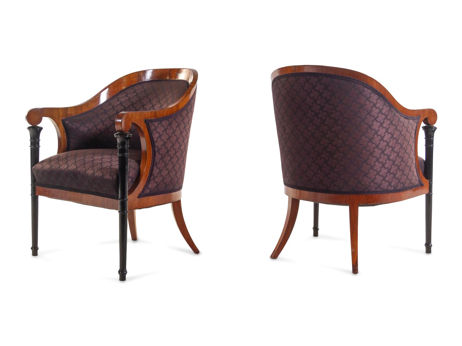 A Set of Four Biedermeier Mahogany Veneered and Parcel Ebonized Armchairs