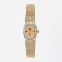 A Pair of Ladies Diamond Dress Watches By Movado and CYMA
