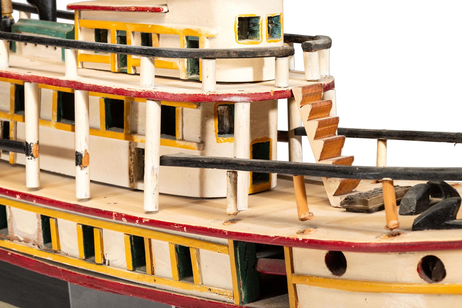 A Carved and Painted Wood Steamboat Model