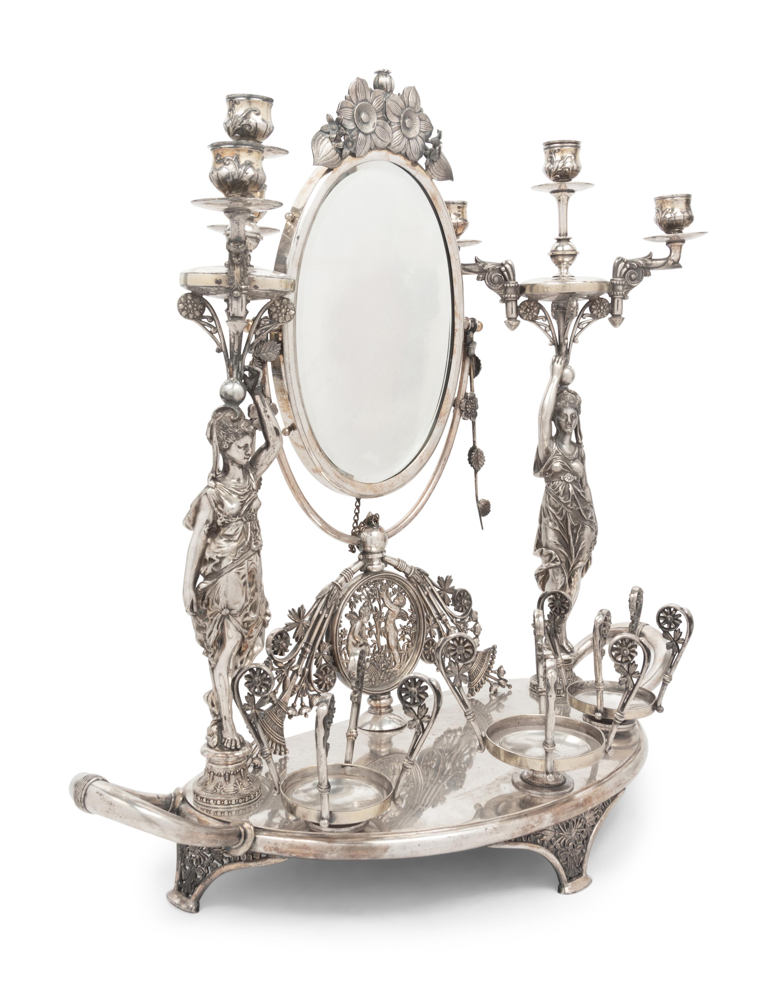 An American Silvered Bronze Figural Vanity Toilet Set