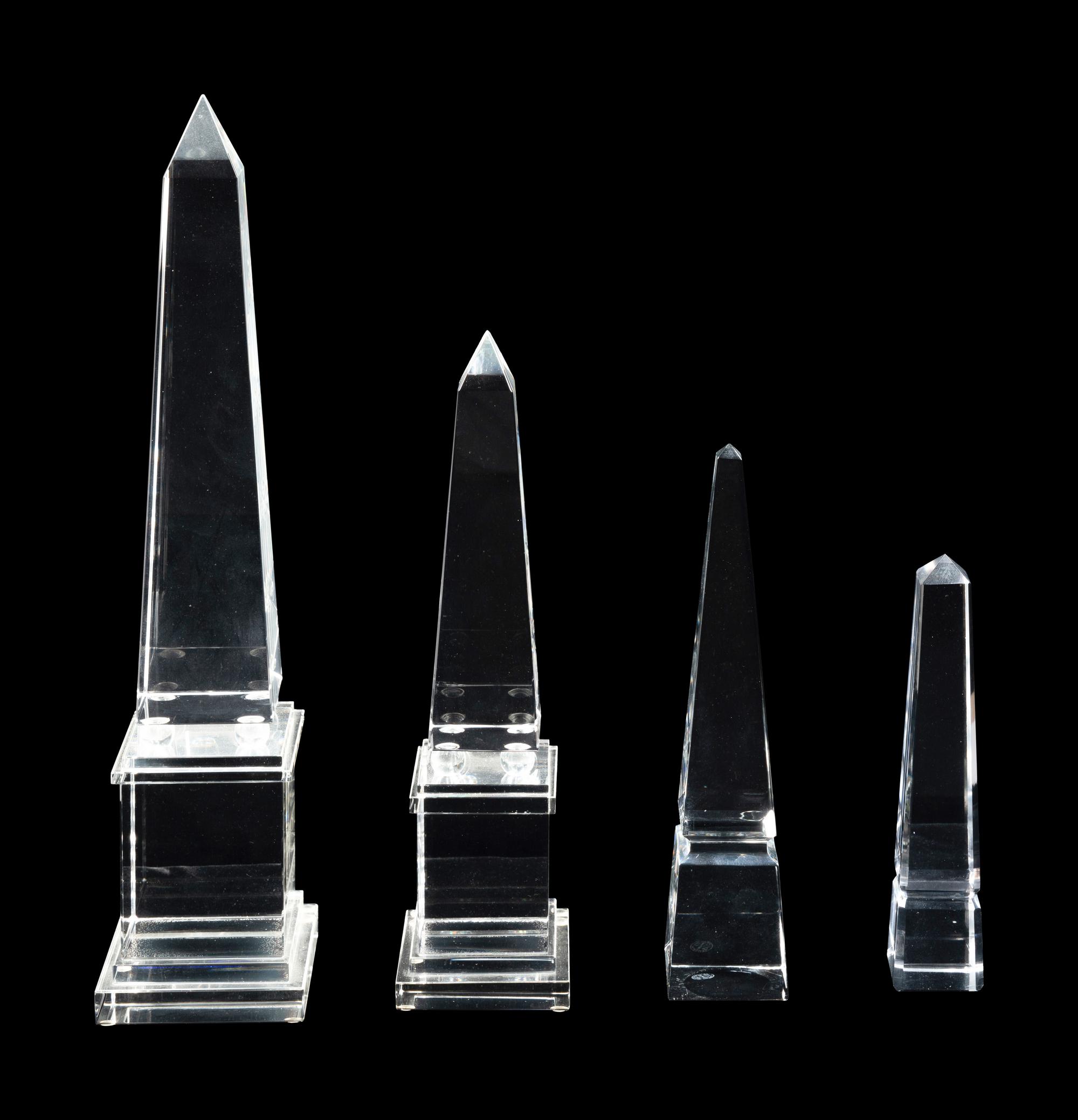 A Group of Four Glass Obelisks