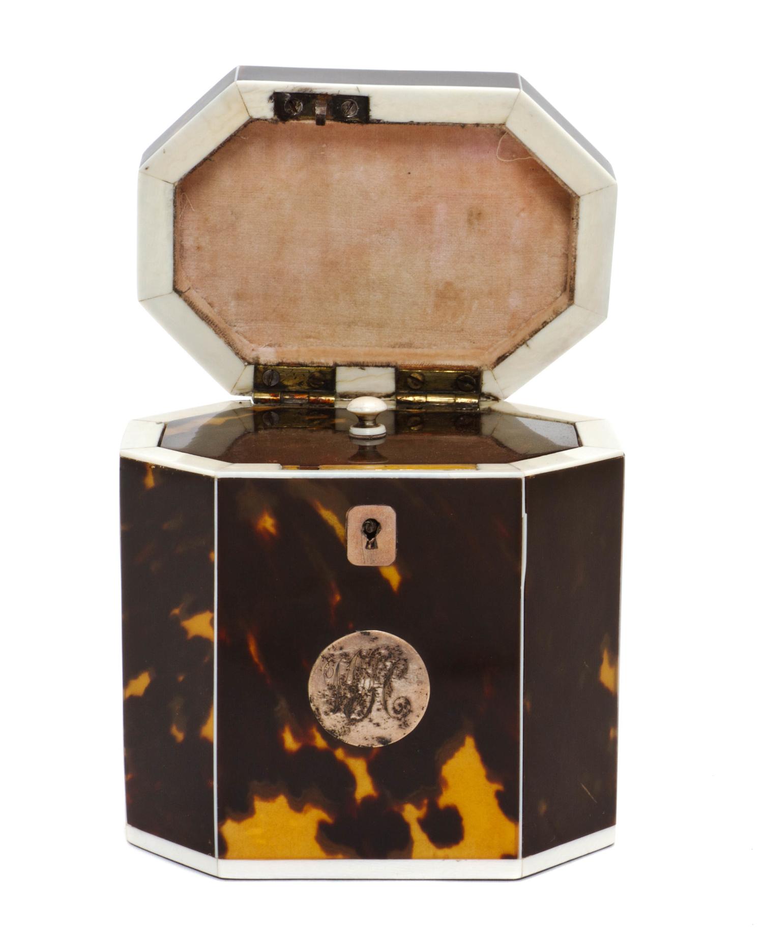 An English Tortoise Shell Tea Caddy, Height 5 1/8 x width 4 1/4 x depth 3 inches.