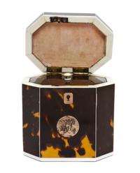 An English Tortoise Shell Tea Caddy, Height 5 1/8 x width 4 1/4 x depth 3 inches.