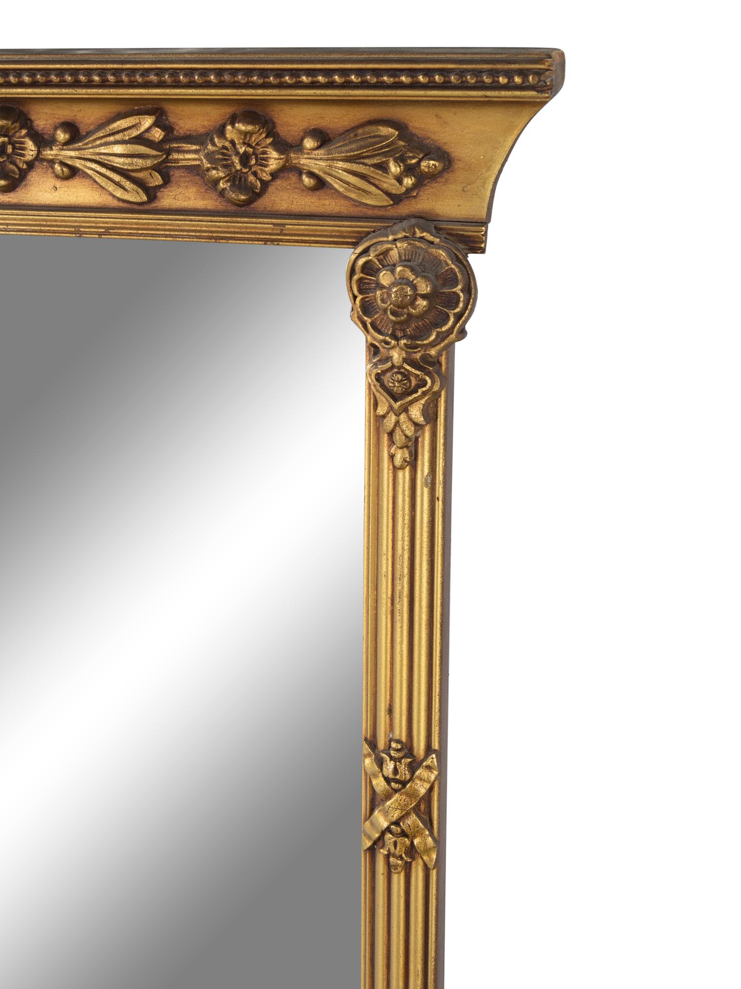 A Neoclassical Style Giltwood Mirror