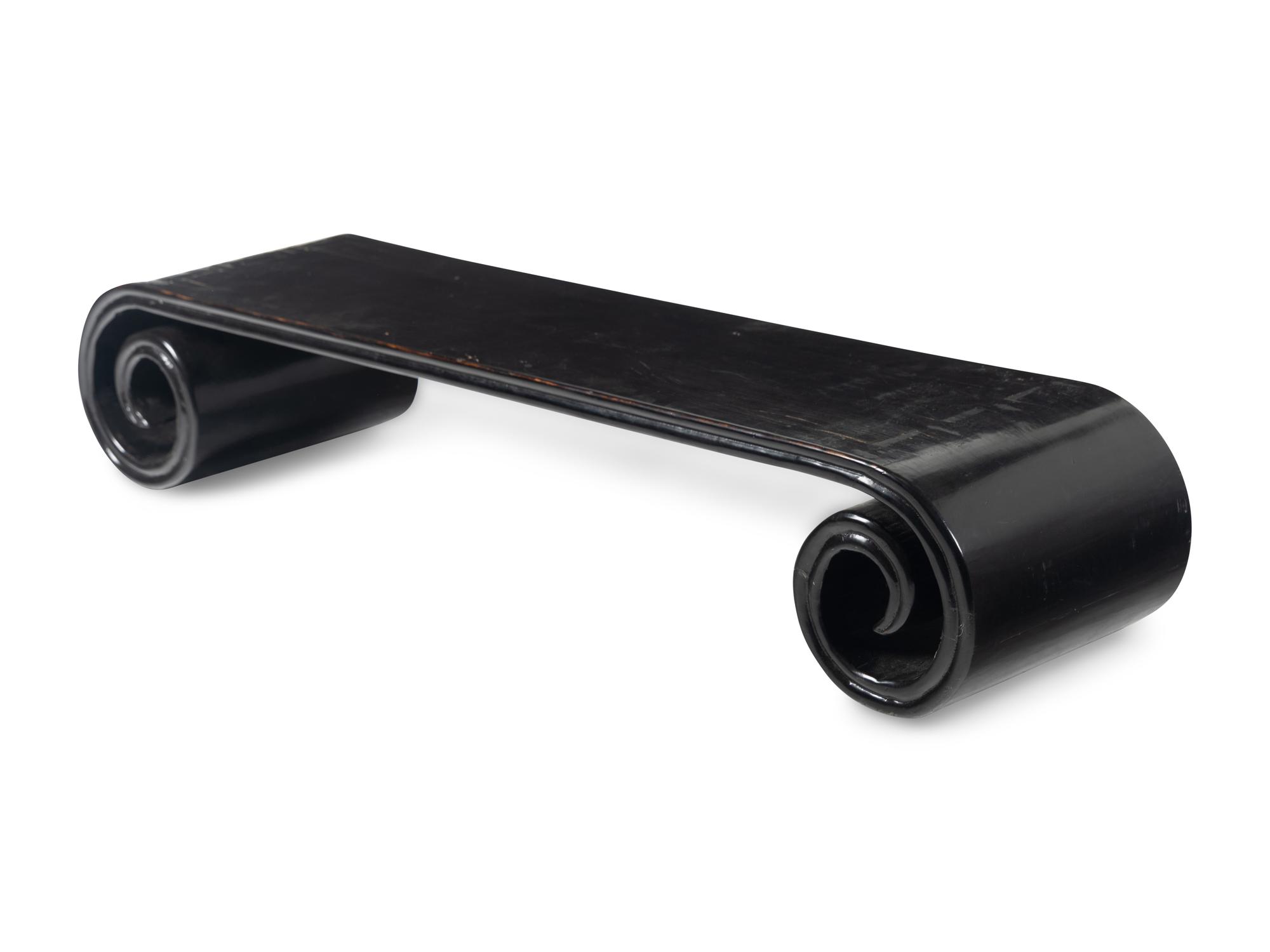 A Chinese Black Lacquered Low Scrolled-Form Low Table, Qinzhuo