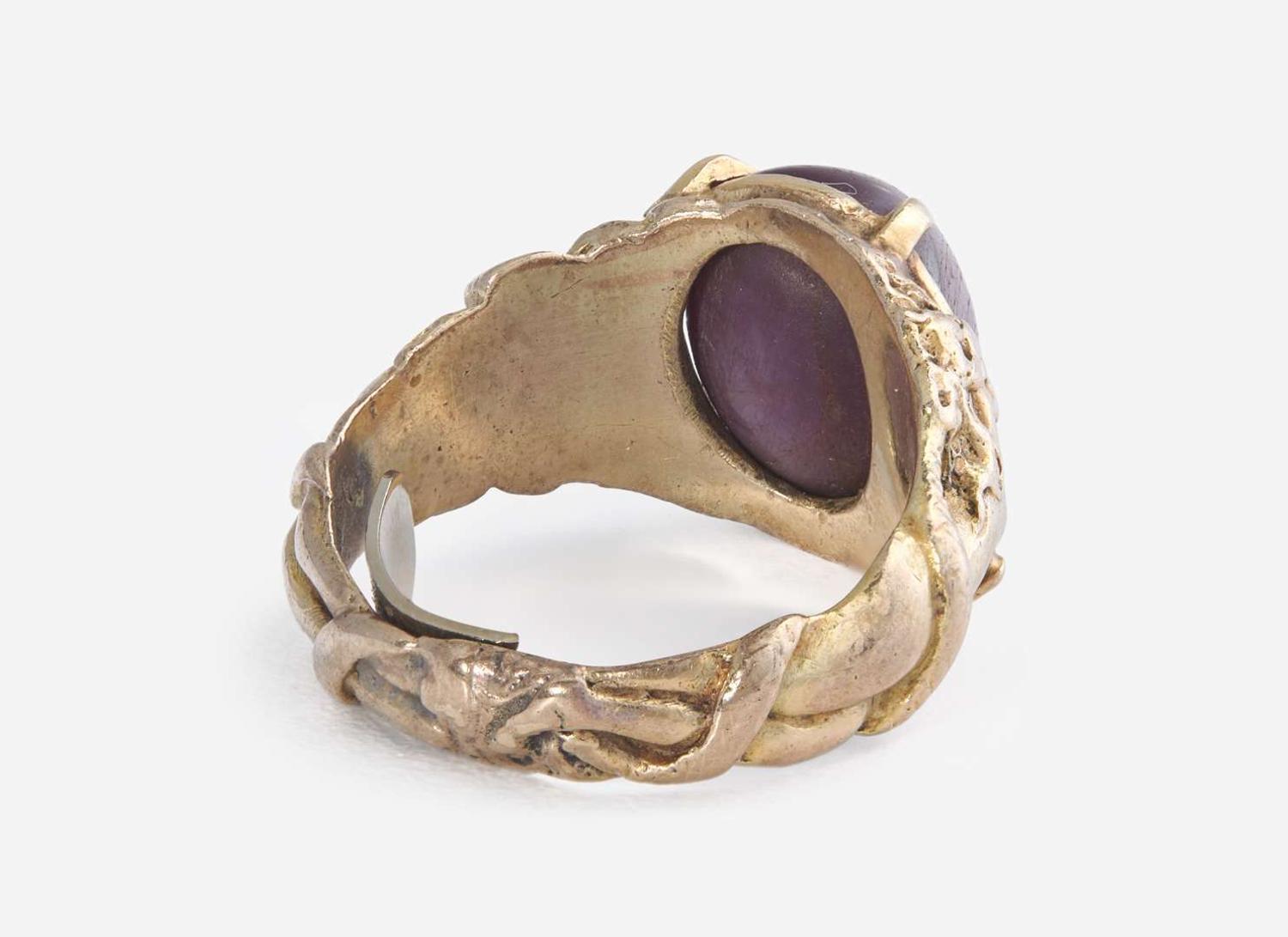 A Men's 10K Yellow Gold and Star Ruby Ring
