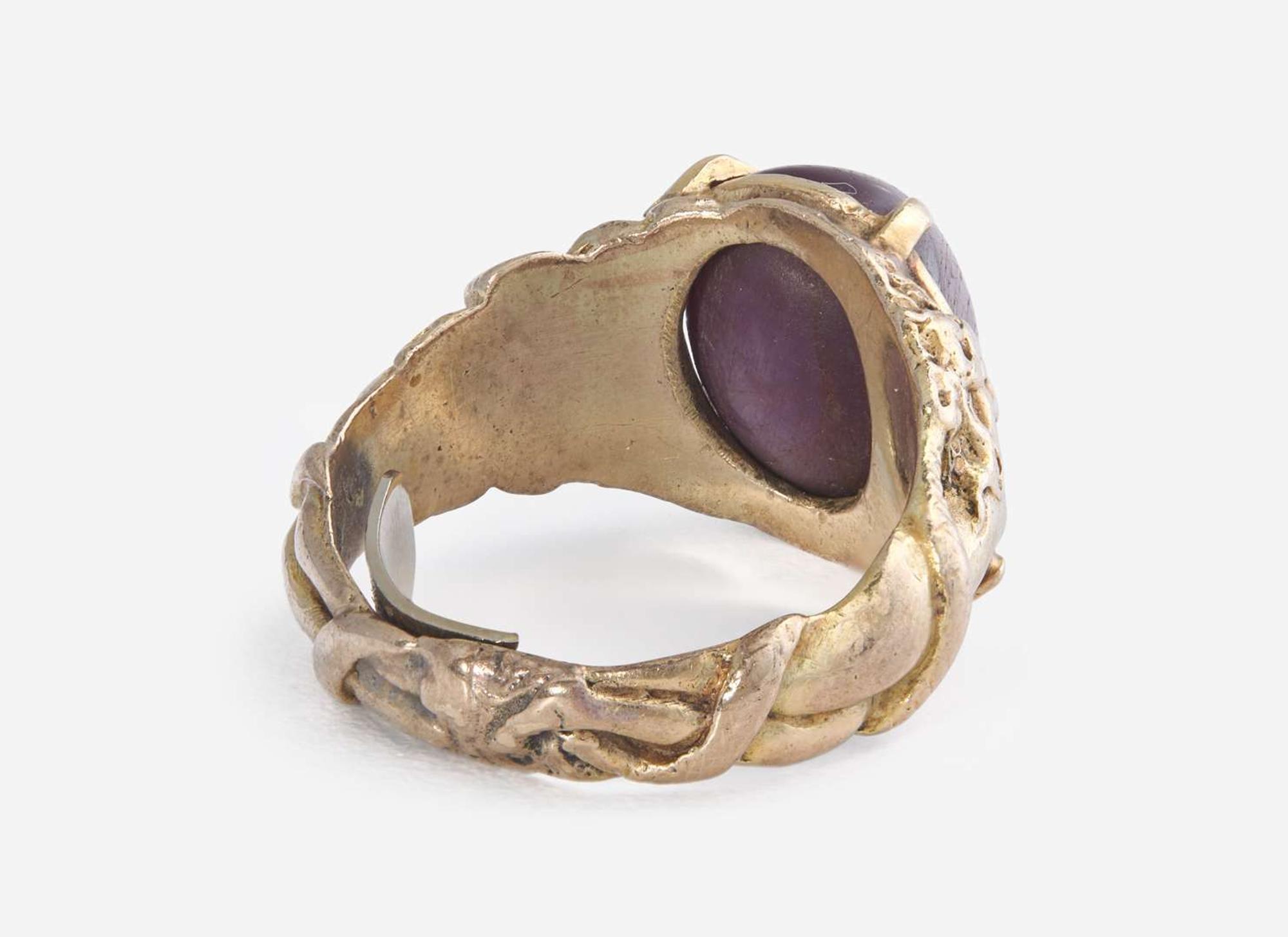 A Men's 10K Yellow Gold and Star Ruby Ring
