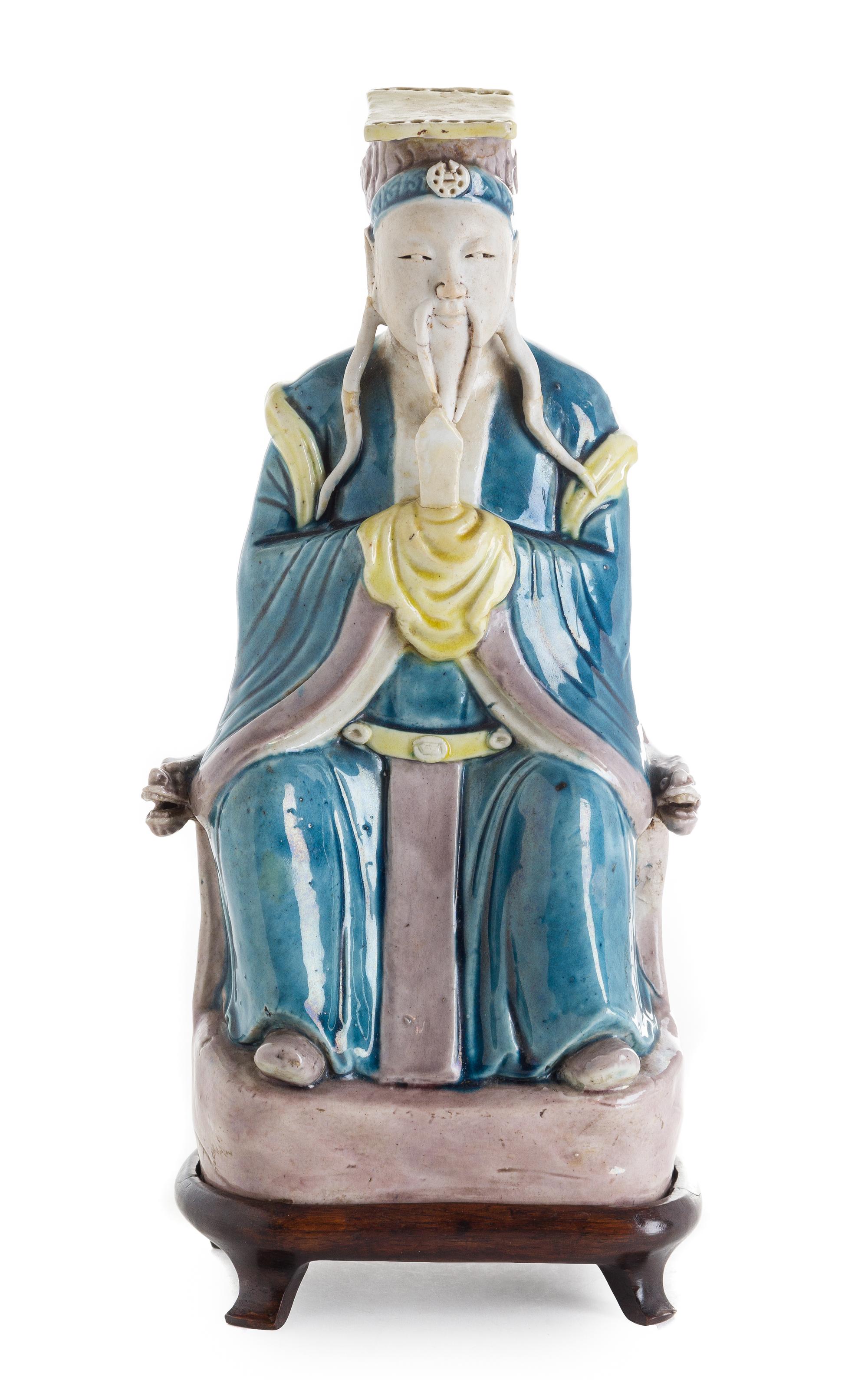 A Turquoise, Yellow and Aubergine Biscuit Glazed Figure of a Daoist Immortal Height 10 1/2 inches. — 18TH/19TH CENTURY