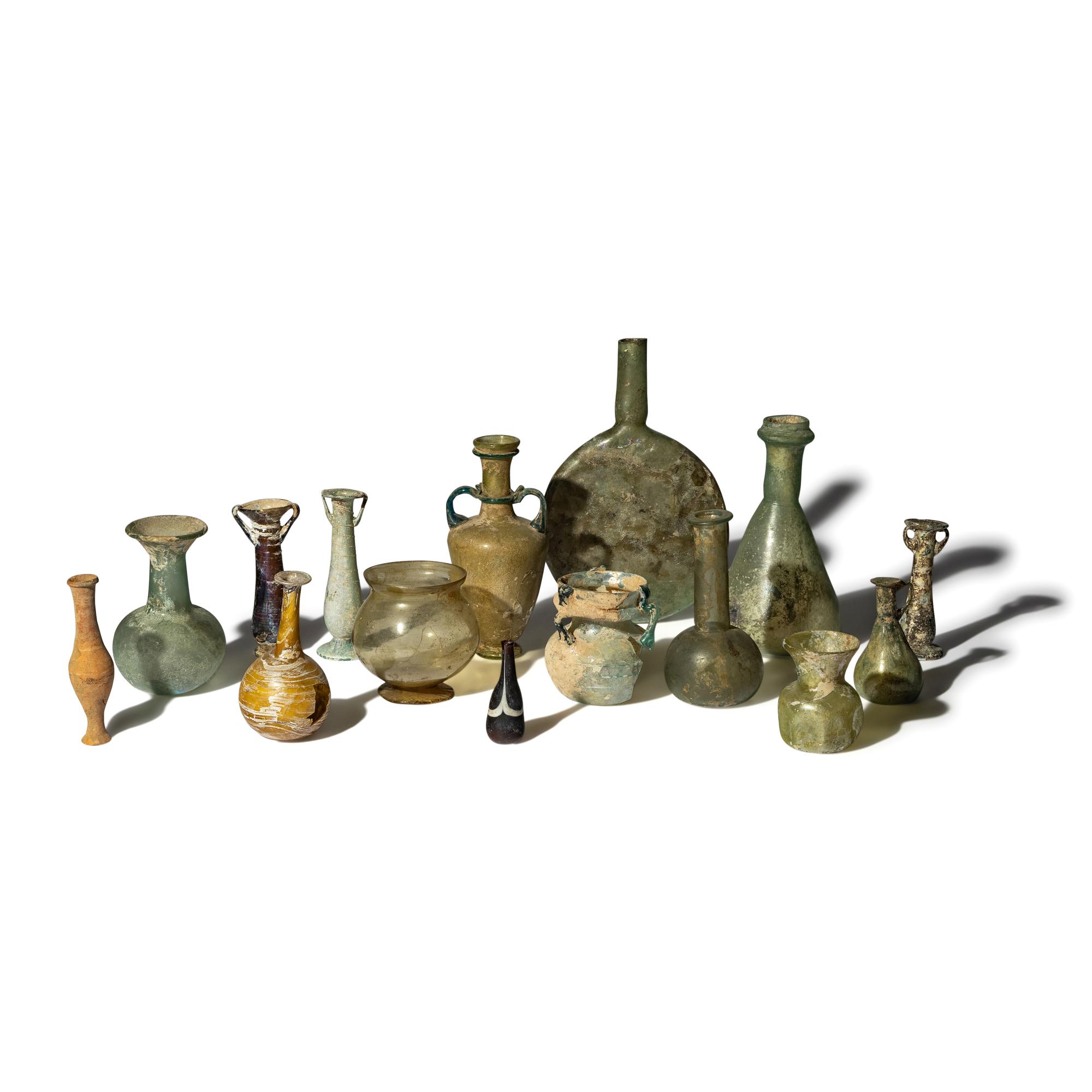 Fifteen Roman and Islamic Glass and Terracotta Vessels