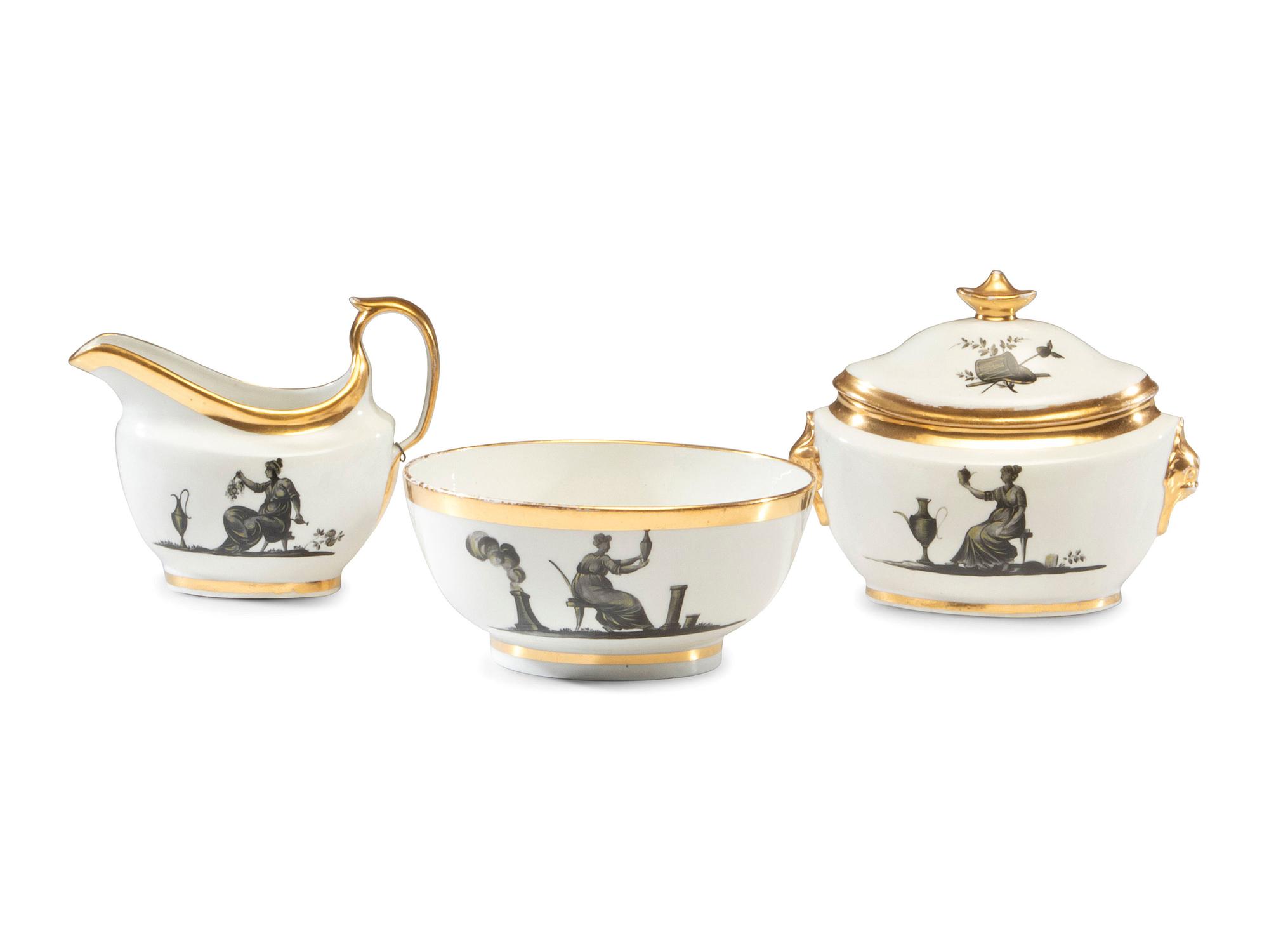 An English Porcelain Bat-Printed and Parcel Gilt Porcelain Tea Service