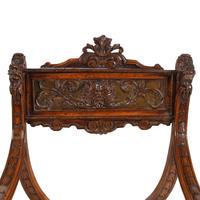 A Pair of Italian Carved Walnut Savonarola Chairs