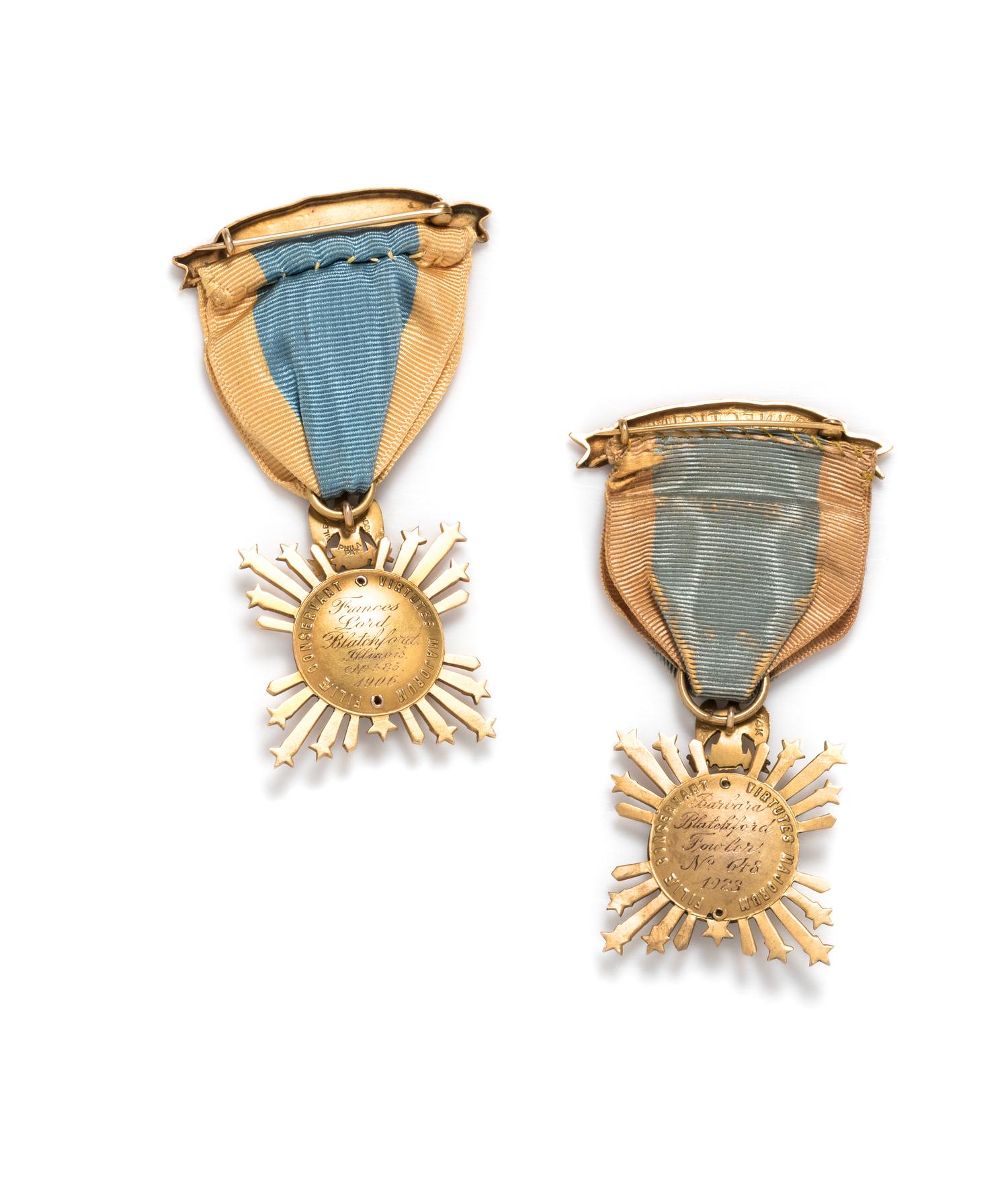 A Pair of 14 Karat Yellow Gold and Polychrome Enamel 'National Society of The Colonial Dames of America' Badges, Bailey Banks and Biddle,