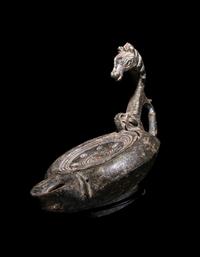 A Roman Bronze Oil Lamp
