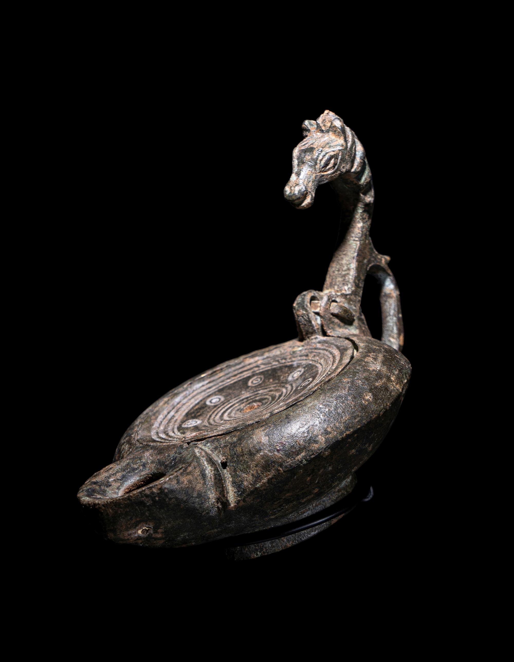 A Roman Bronze Oil Lamp
