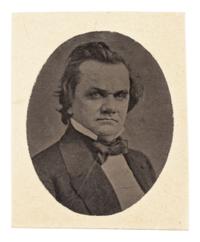 [LINCOLN-DOUGLAS DEBATES]. A pair of miniature photographs of Abraham Lincoln and Stephen A. Douglas, ca. 1860.
