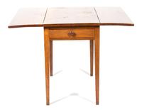 A Walnut Drop Leaf Table Height 28 1/2 x width with leaves up 40 x depth 35 inches. — 20TH CENTURY
