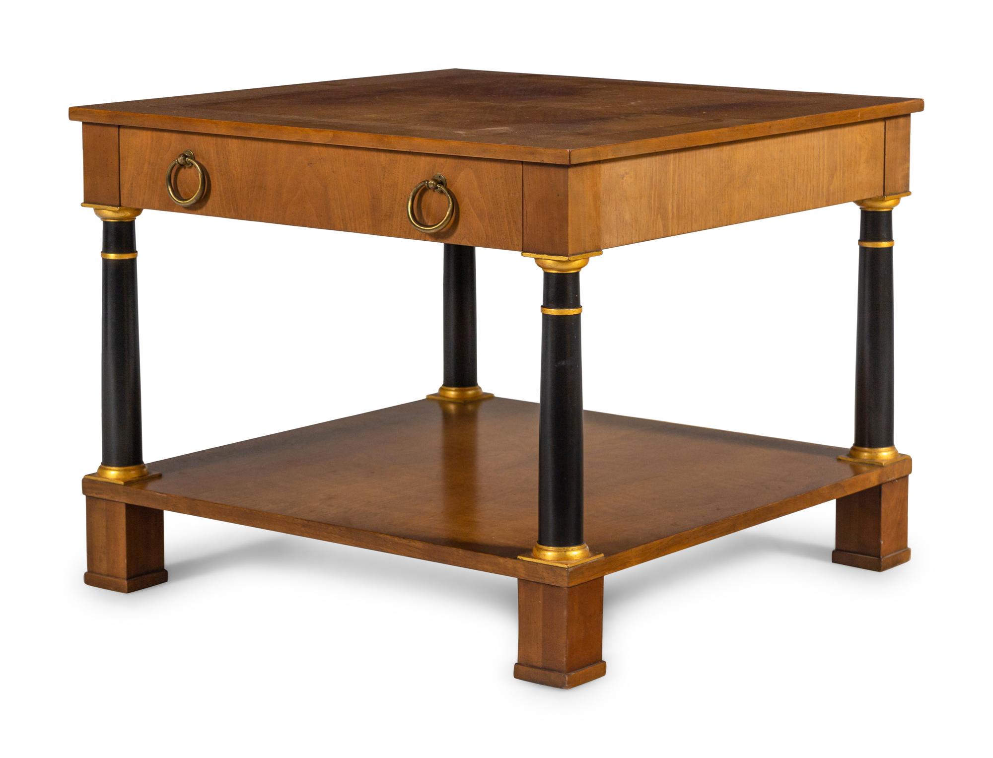 A Baker Walnut Side Table with Gilt and Ebonized Supports