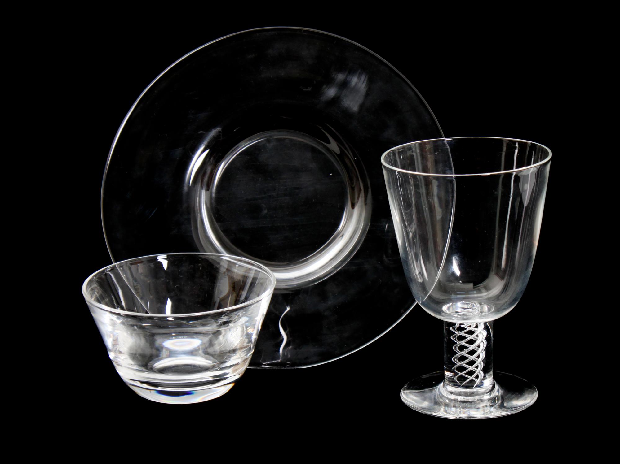 A Collection of Steuben Crystal Dinnerware Diameter of plates 8 3/4 inches