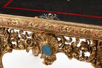 A Louis XV Style Gilt Bronze and Specimen Marble Table