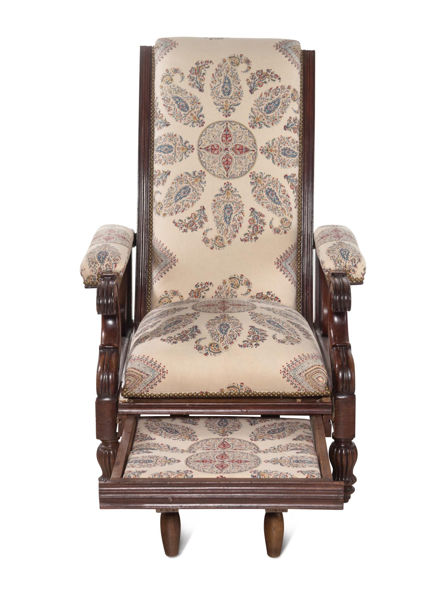 A Mahogany Reclining Armchair with Pull-Out Footrest