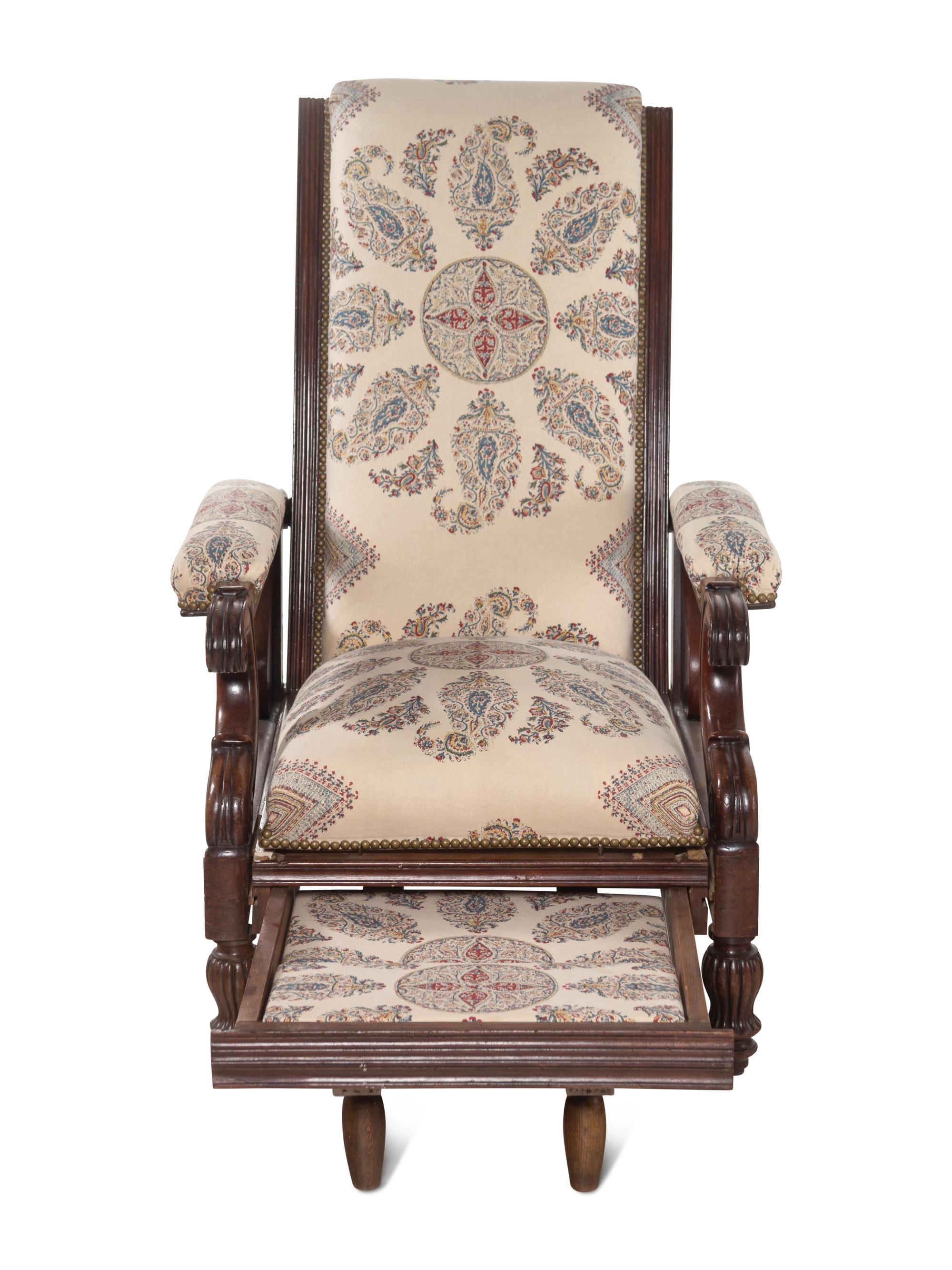 A Mahogany Reclining Armchair with Pull-Out Footrest