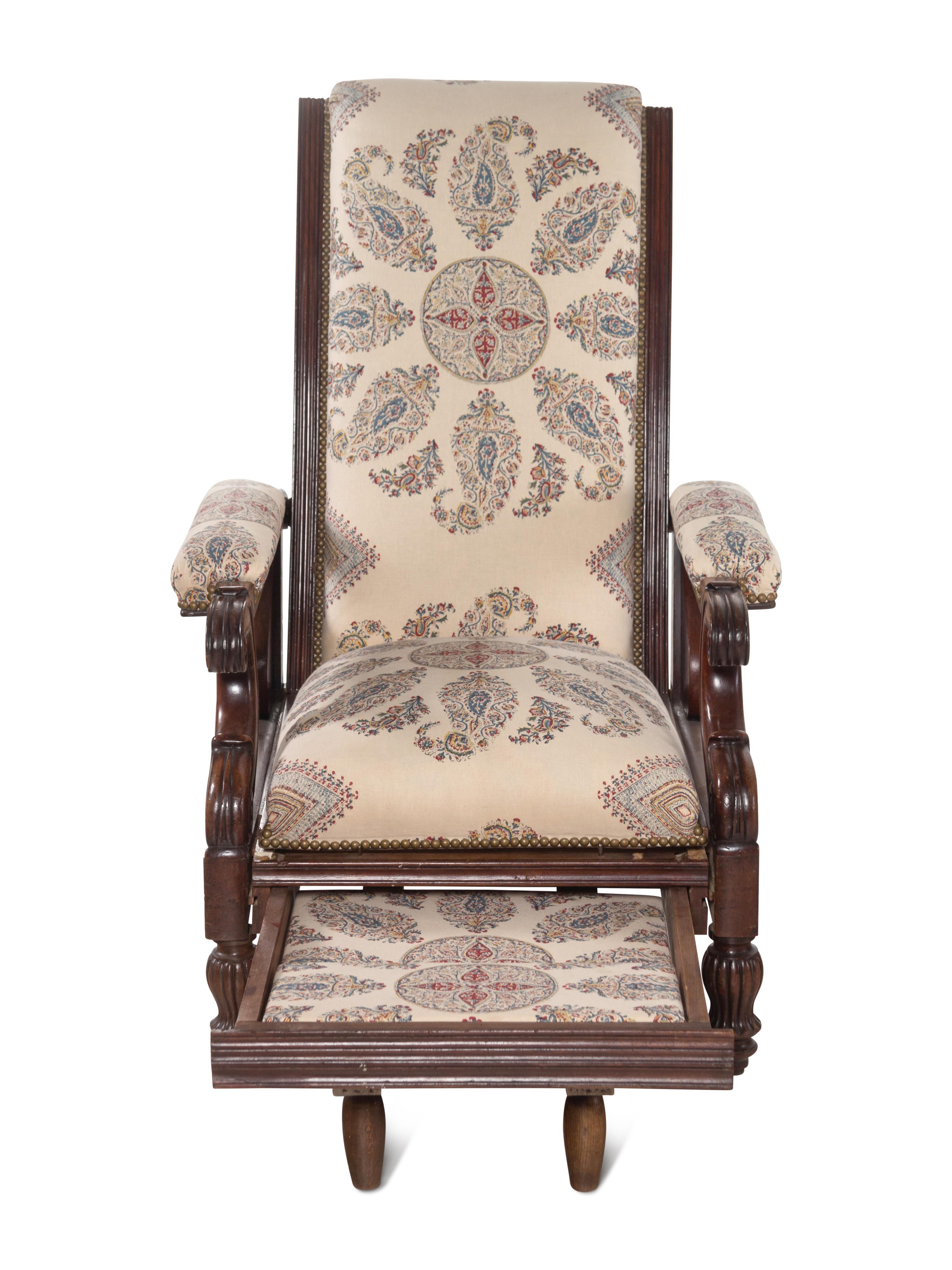 A Mahogany Reclining Armchair with Pull-Out Footrest