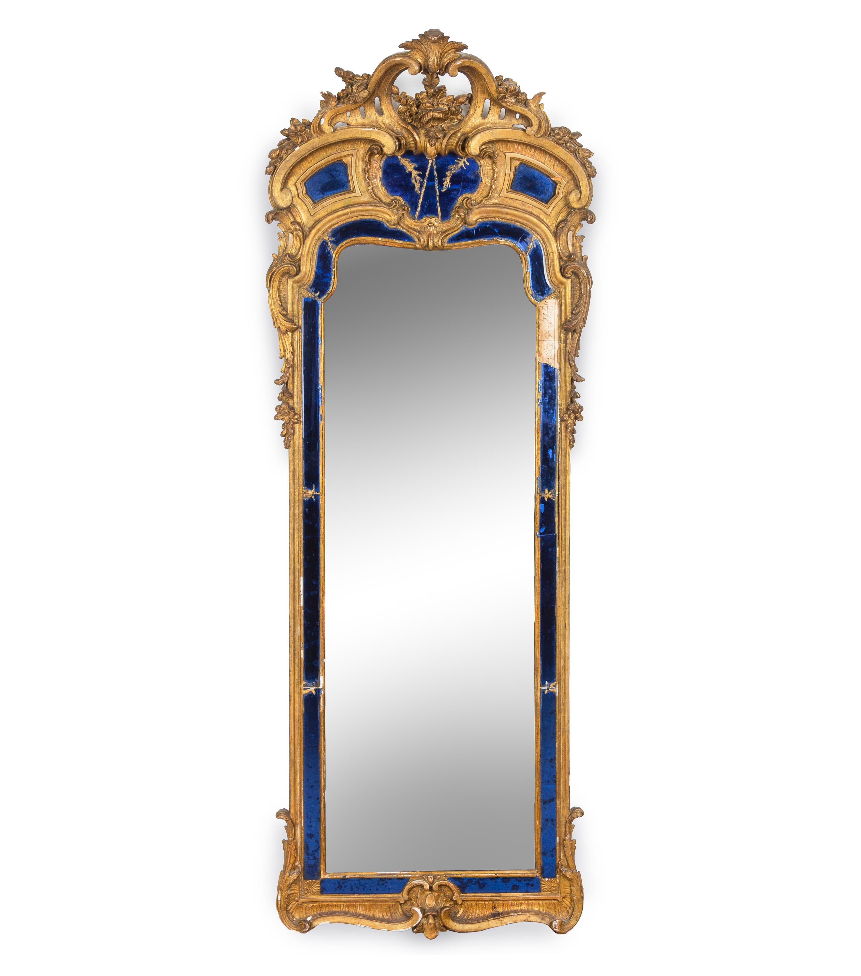 A Continental Rococo Style Giltwood Pier Mirror