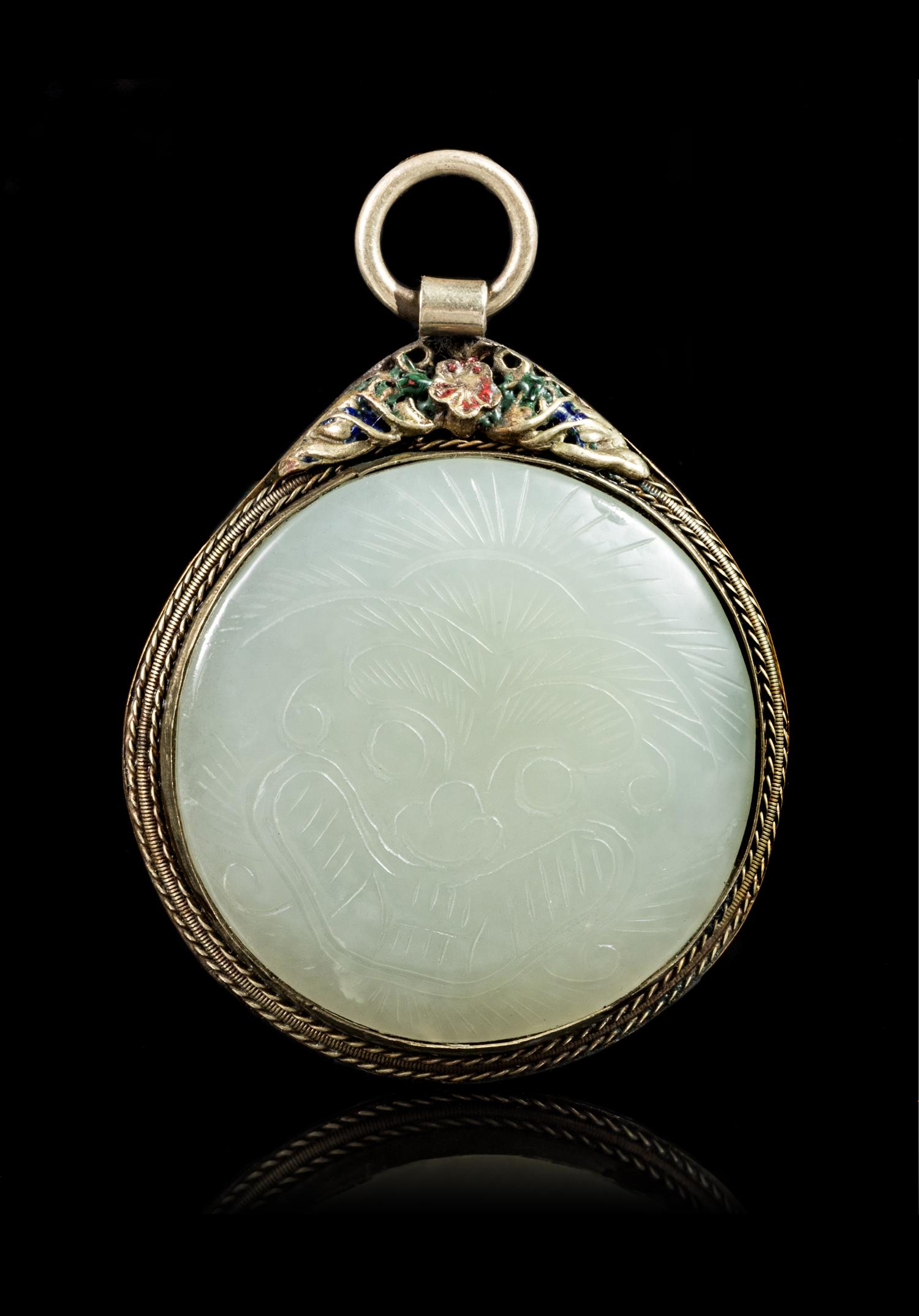 A Chinese White Jade Inset Silver Pendant