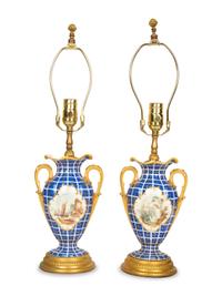 A Pair of Continental Gilt Bronze Mounted Porcelain Lamps — 19TH CENTURY
