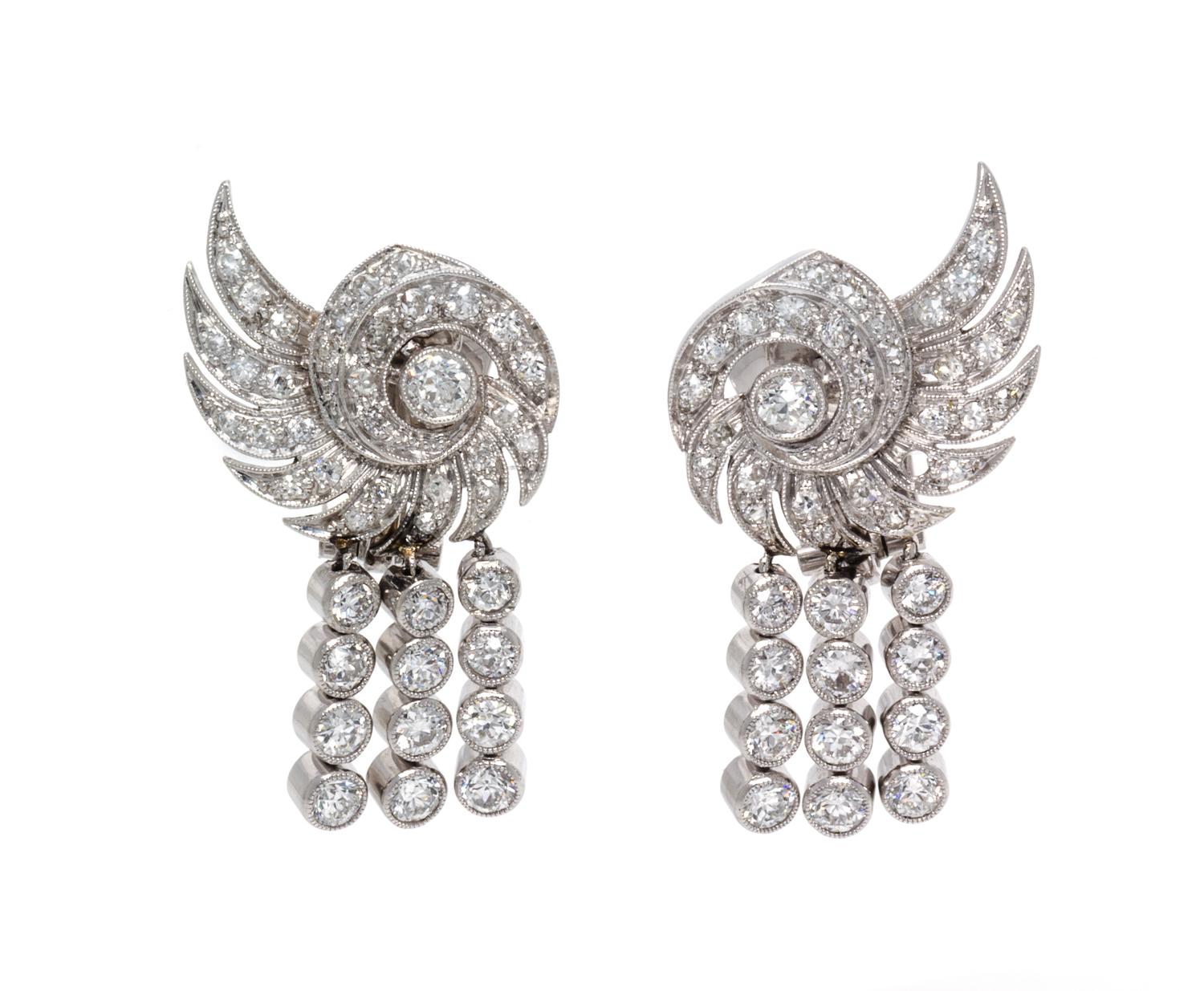 A Pair of Platinum and Diamond Earclips, 9.30 dwts.