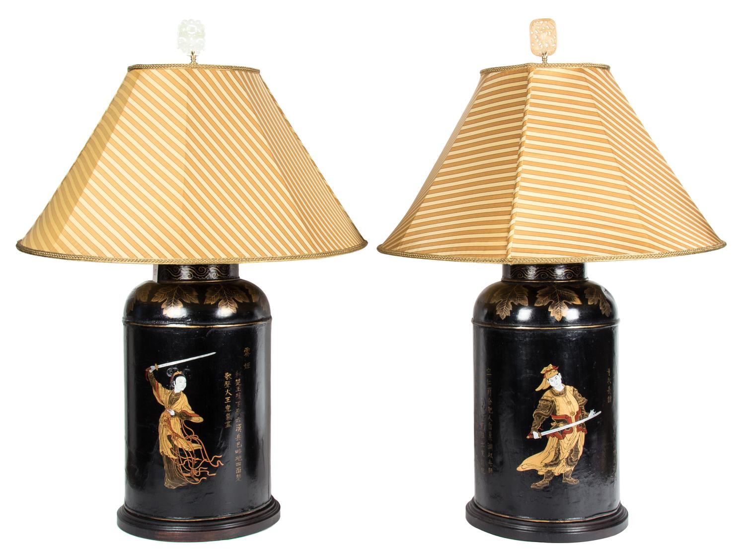 A Pair of Chinese Painted Black Tole Lamps Height to socket 23 inches.