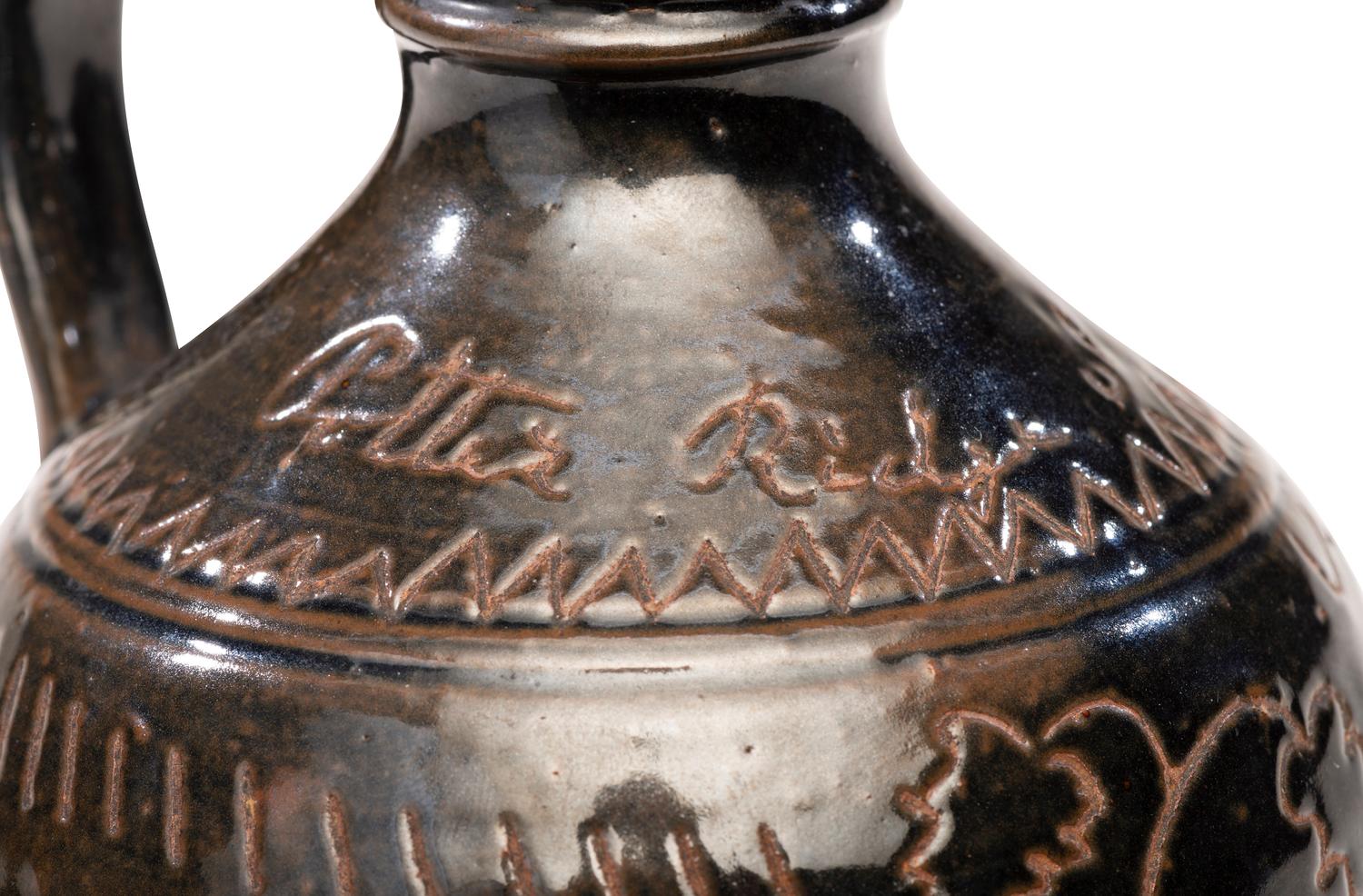 A Potter Ridge Albany Slip-Glazed and Incised Jug