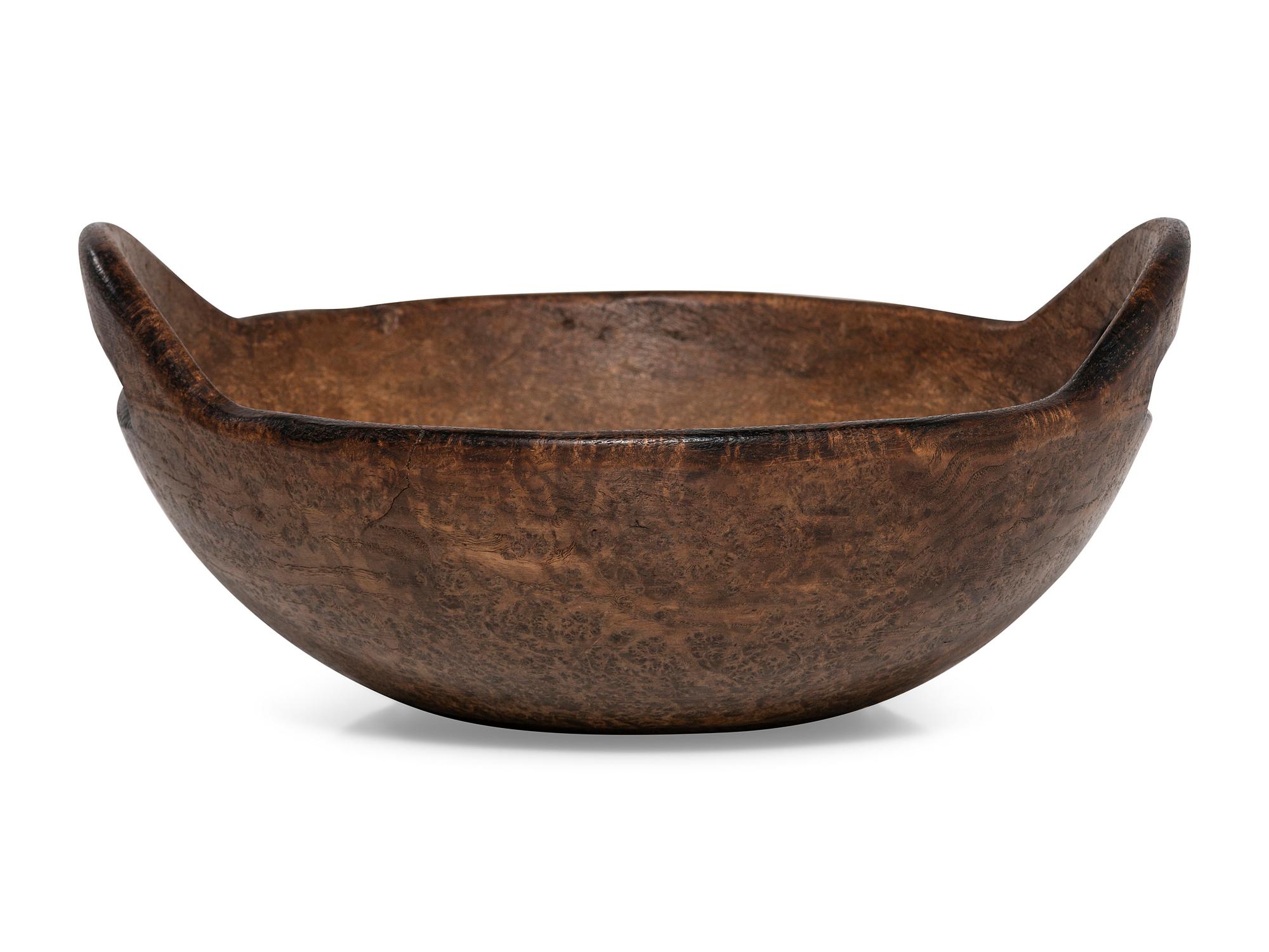 A Fine Turned and Carved Bird's Eye Burl Maple Bowl