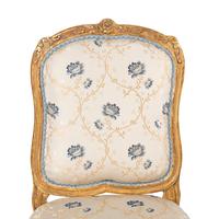 A Pair of Louis XV Carved Giltwood Chaises à la Reine