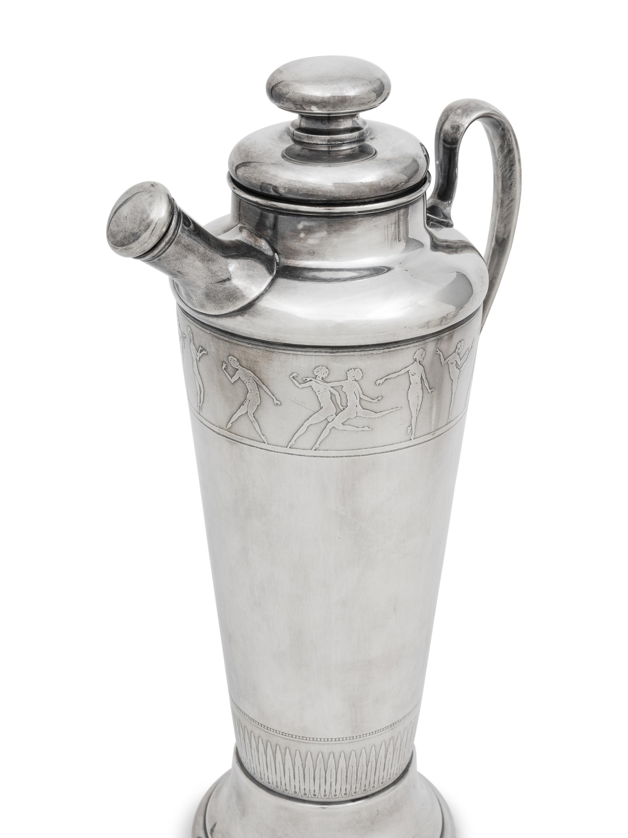 A Group of Four Cocktail Shakers