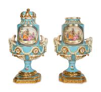 A Pair of Sèvres Style Porcelain Urns