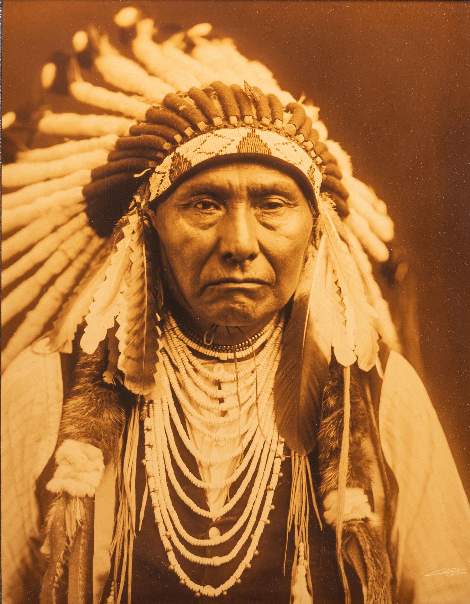 CURTIS, Edward (1868-1952). Chief Joseph. Curtis Centennial Project gold toned photograph.